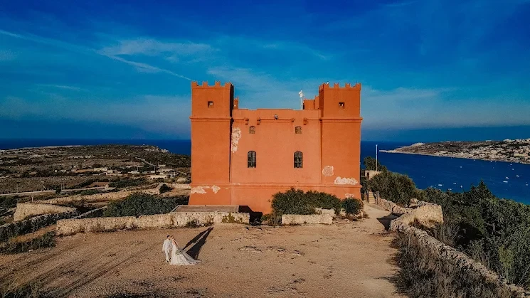 Emanuela Venuti fotografo matrimonio - sposi tramonto dorato